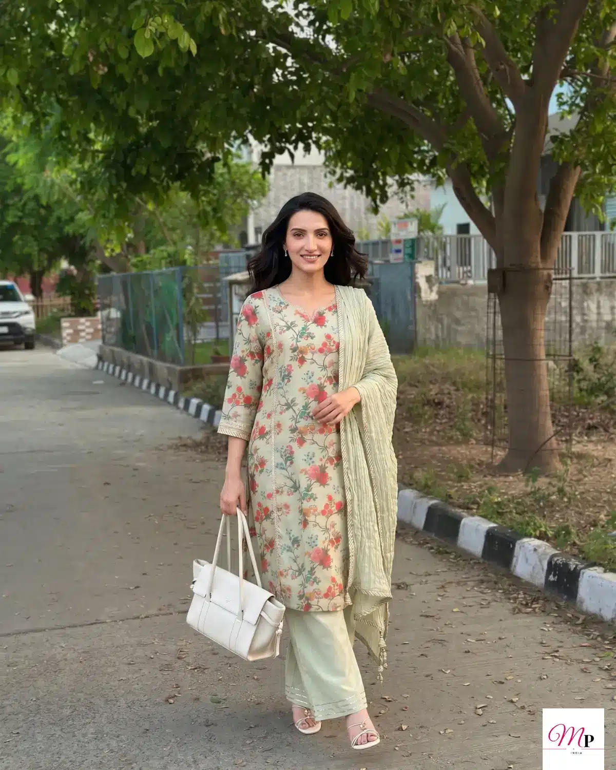 Daytime accessorized sequin kurta showing fabric drape and colour accuracy after wear test