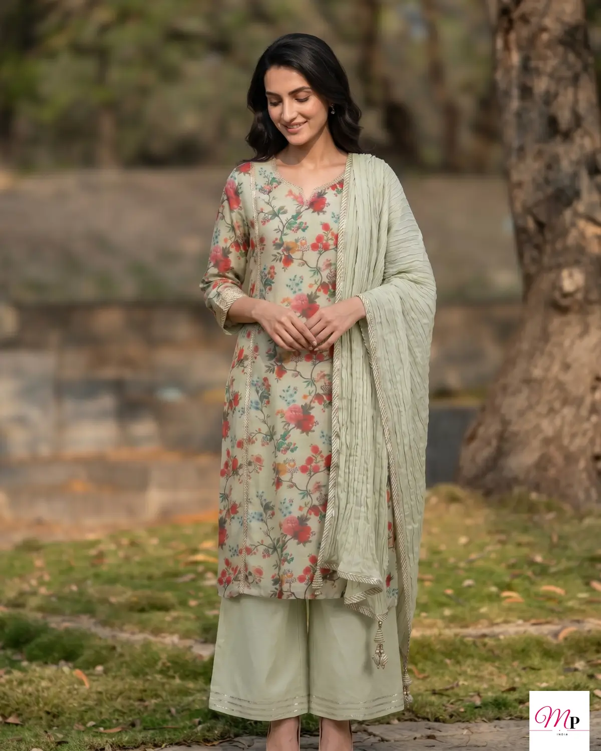 Green floral sequinned kurta with palazzos styled for sangeet arrival in Bhubaneswar