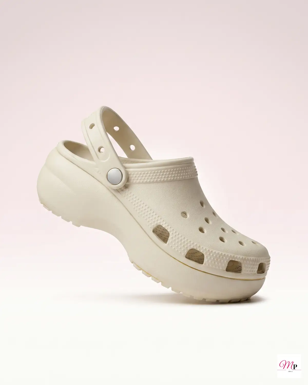 Crocs platform clog side profile showing 4.1cm sole thickness against soft pink background — platform clogs summer India