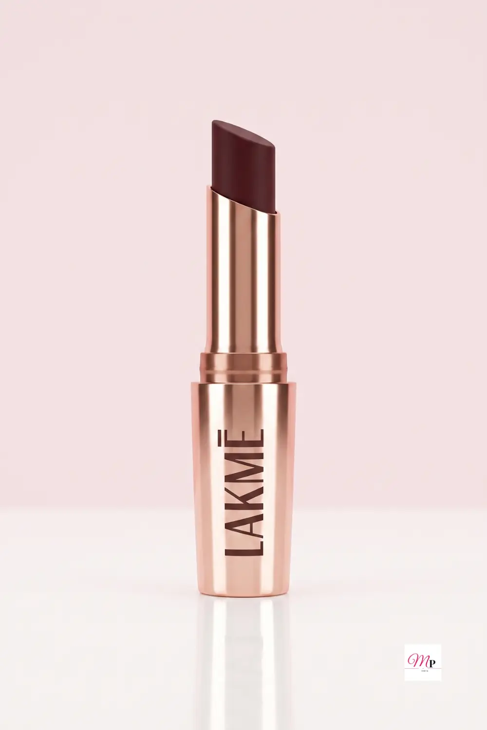 Lakme primer matte lipstick rose gold tube against blush pearl backdrop