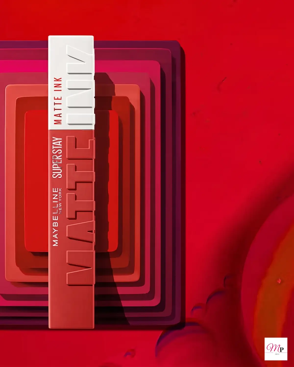 Maybelline SuperStay Enchanter 380 layered artistic composition with bold berry red tones