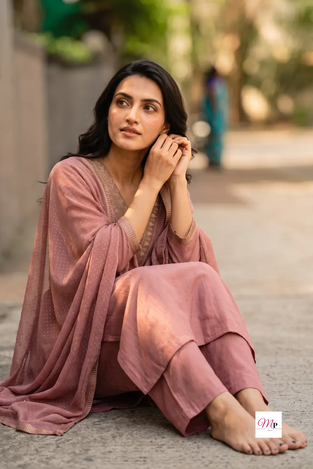 Relaxed seated pose showing dupatta drape and trouser fit on embroidered kurta trousers dupatta set, Gerua by Libas