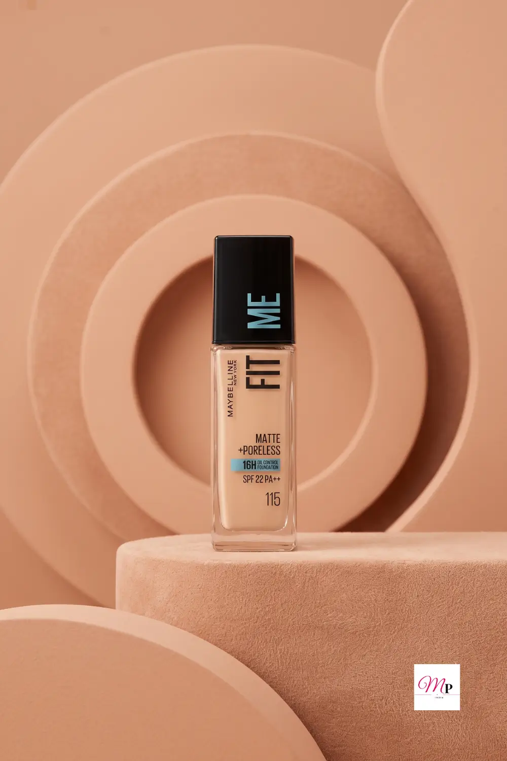 Maybelline Fit Me Foundation bottle on beige sculptural pedestal with circular background elements