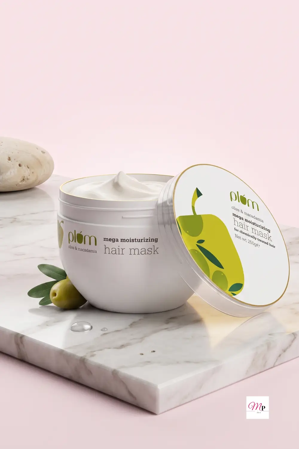 Open Plum Olive Macadamia hair mask jar showing creamy white texture on marble slab with olive fruit — deep conditioning hair mask for chemically treated hair