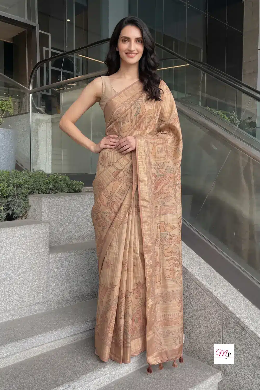 Soch Warli silk blend handloom saree full front view showing beige warli art print and border detail on modern staircase