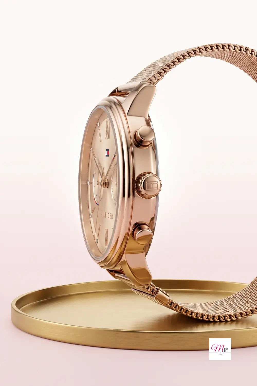 Tommy Hilfiger women gold watch myntra — side profile showing case thickness crown and pusher details