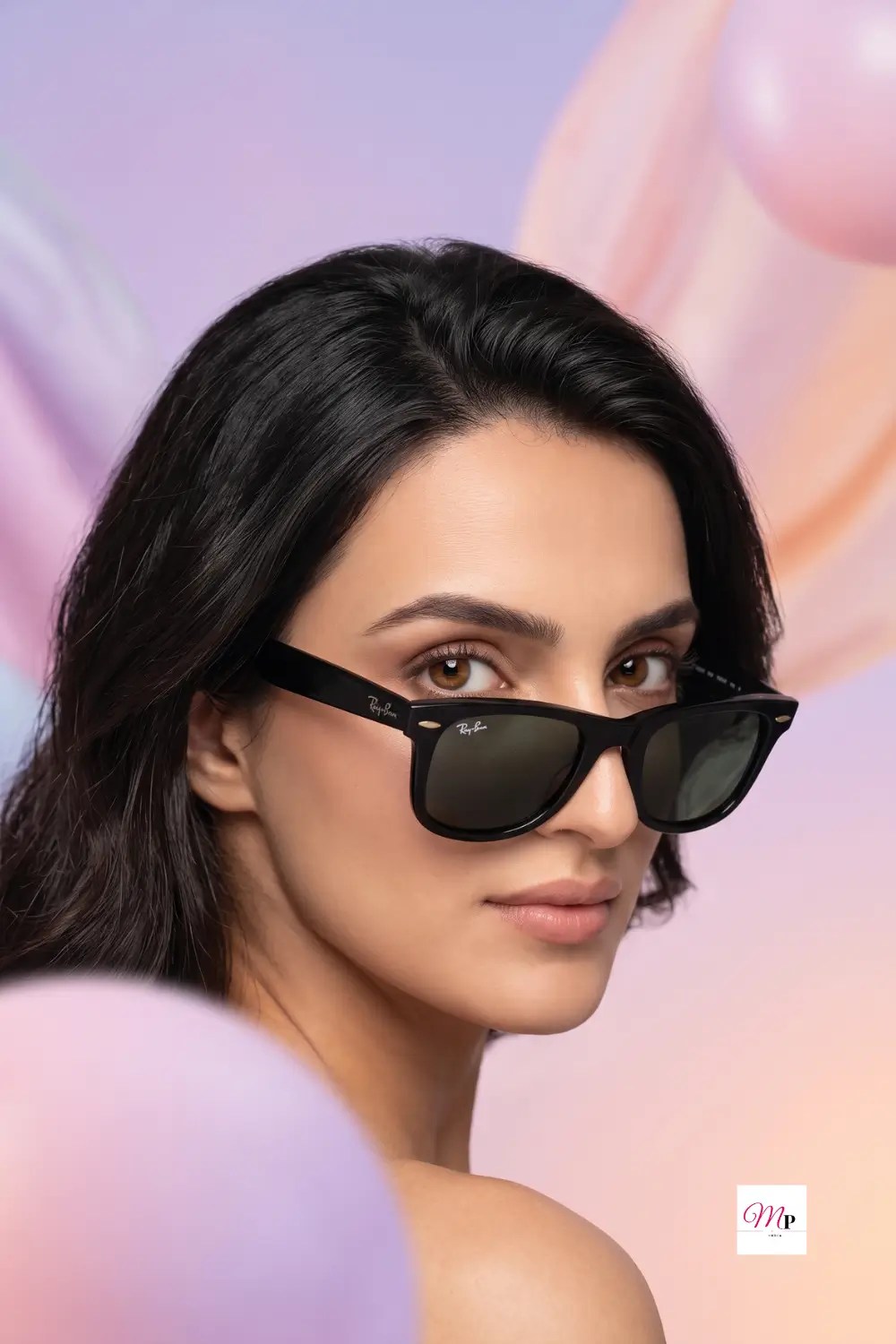 Trishika wearing Ray-Ban Wayfarer Ease square sunglasses India in soft pink editorial portrait