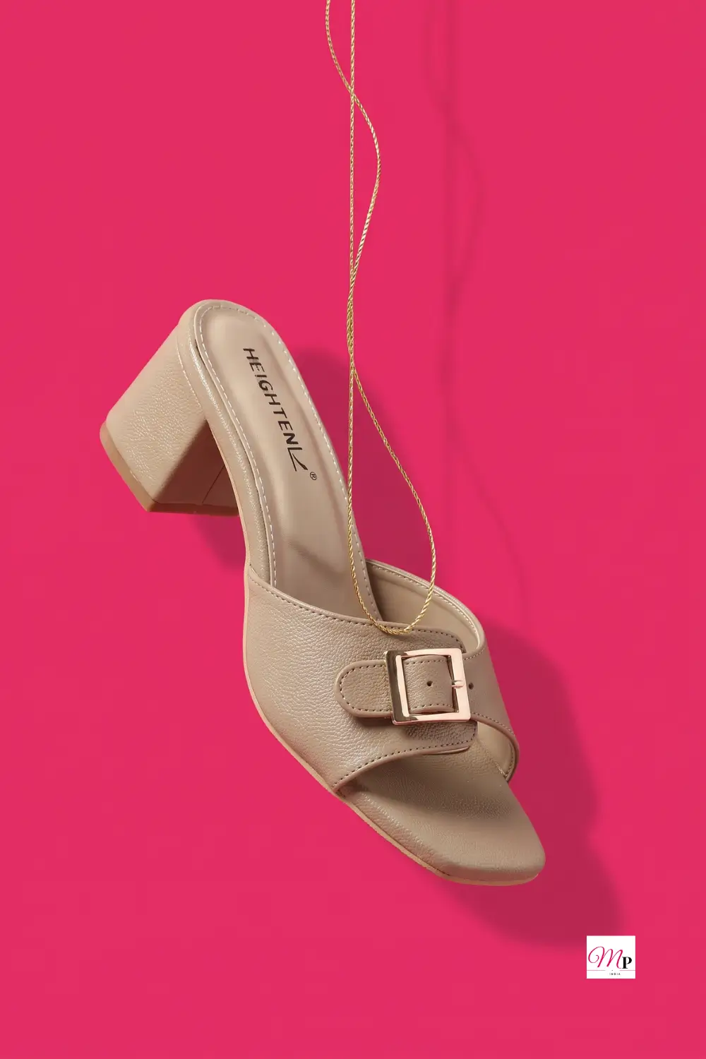 Heighten block heel mule suspended by cord showing branded insole, chunky block heel and welt stitching
