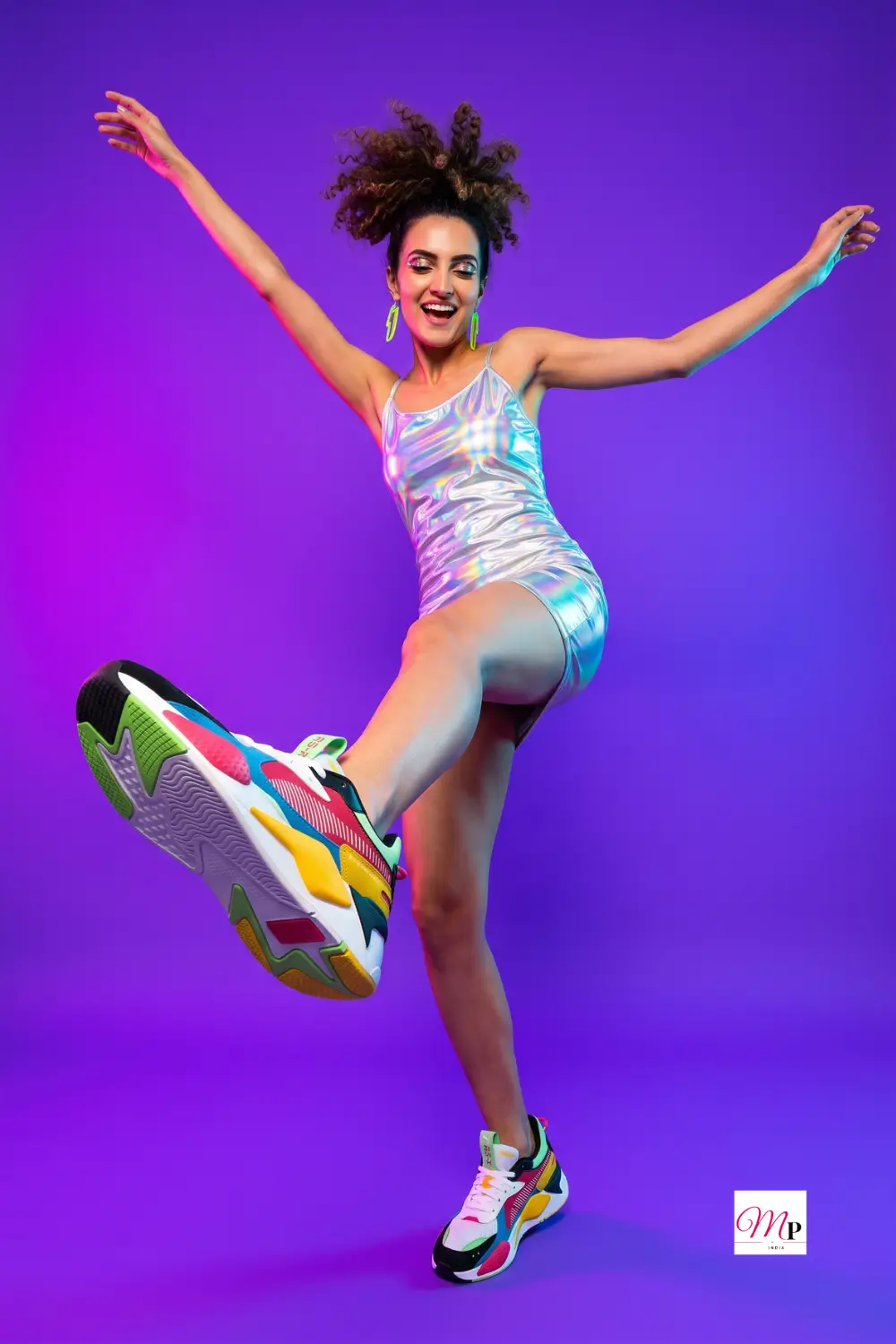 chunky sneakers high kick showing sculpted sole dance floor energy