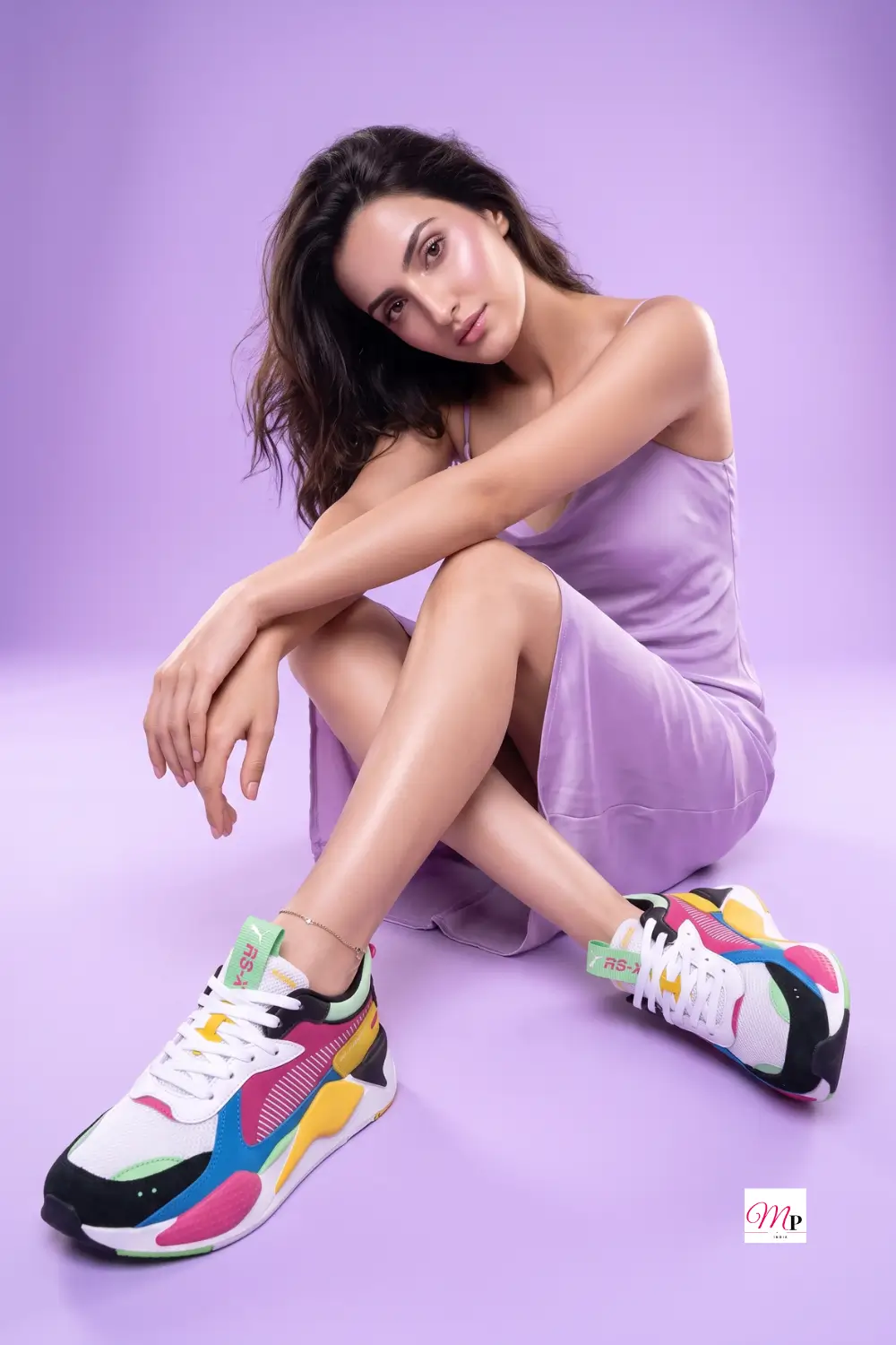 platform sneakers paired with lilac satin slip dress studio portrait