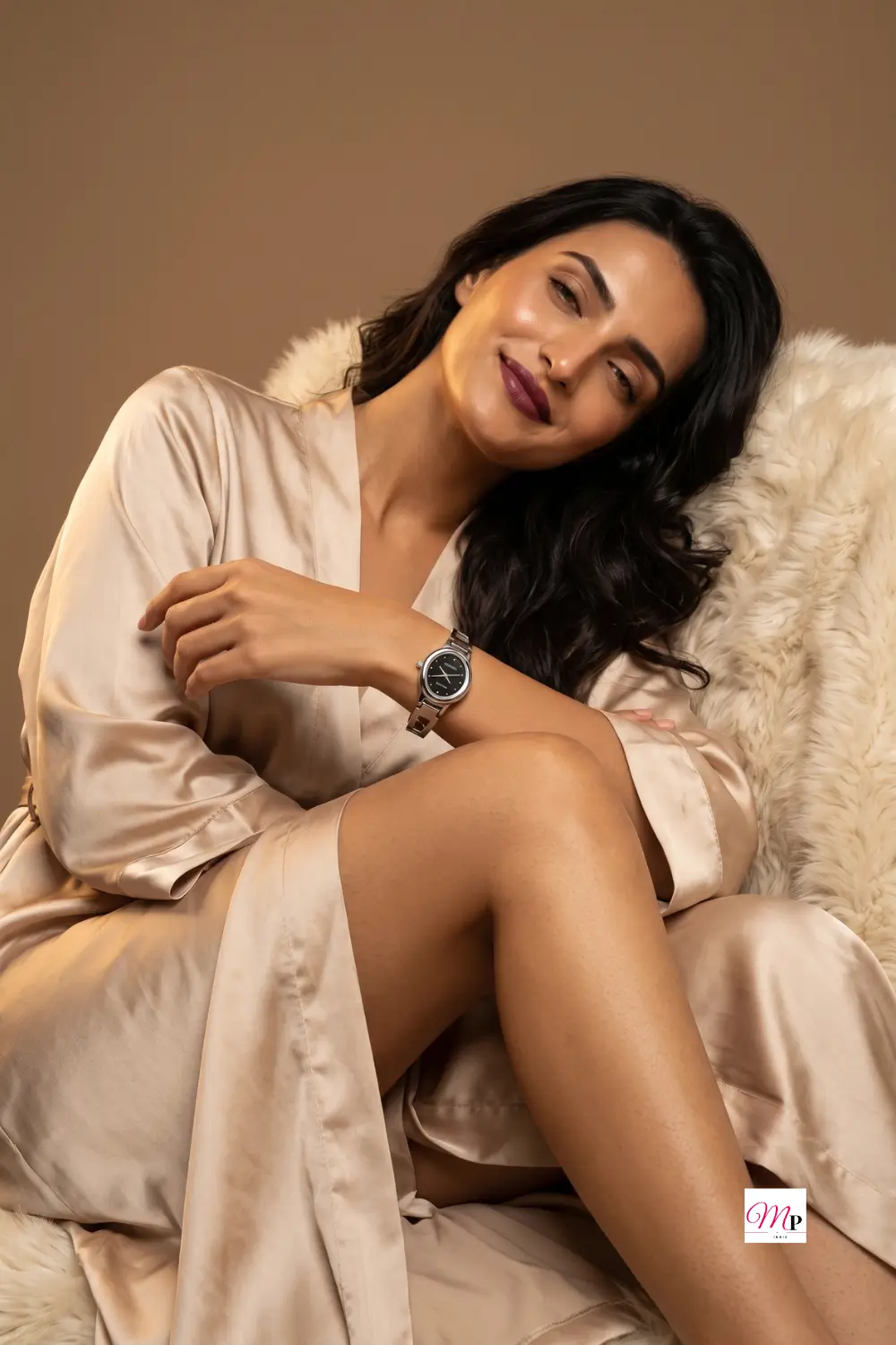 Sonata everyday analog black dial watch worn with champagne silk robe in warm morning light