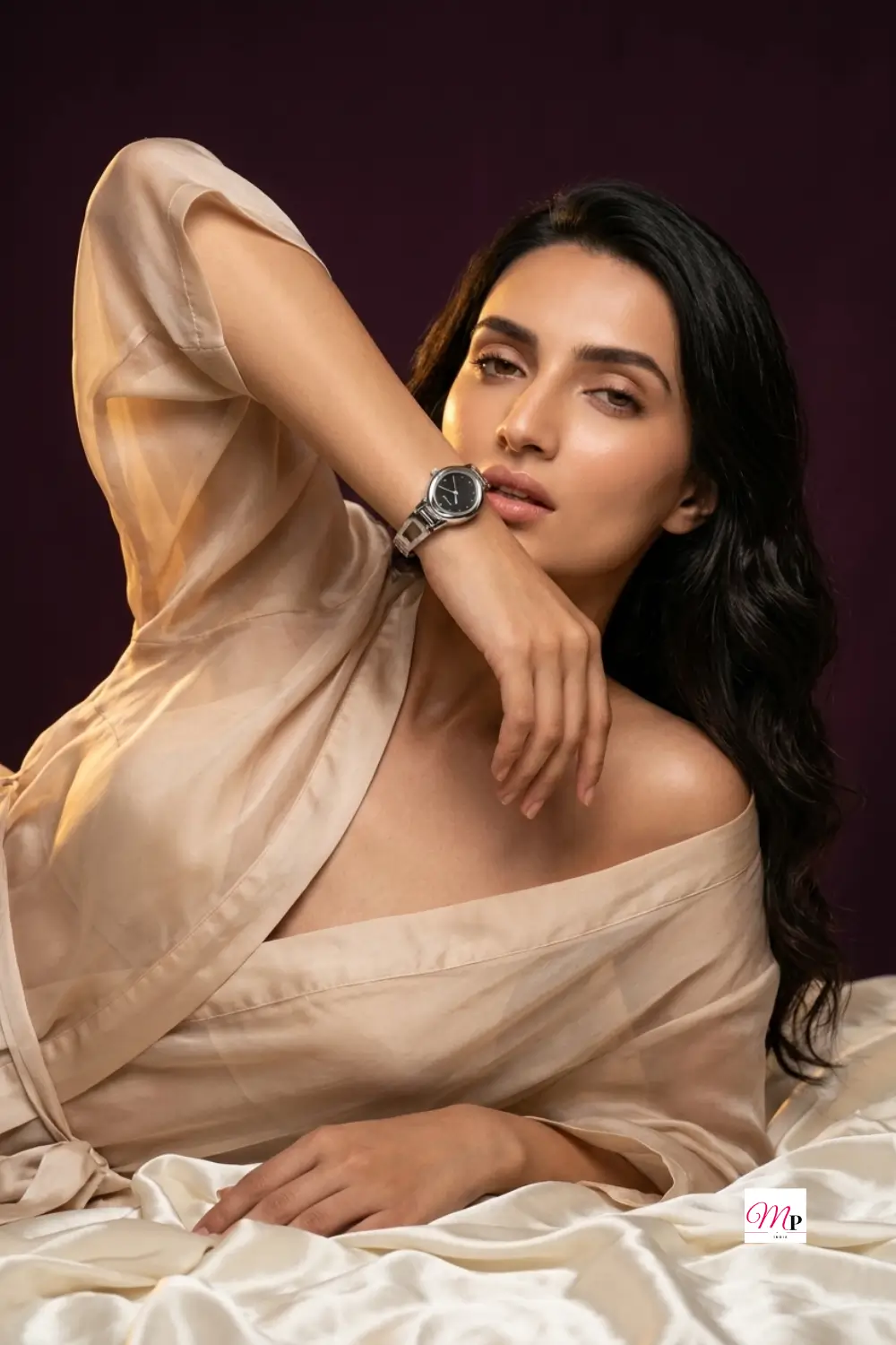 Sonata ladies quartz watch with black dial styled against deep plum evening backdrop