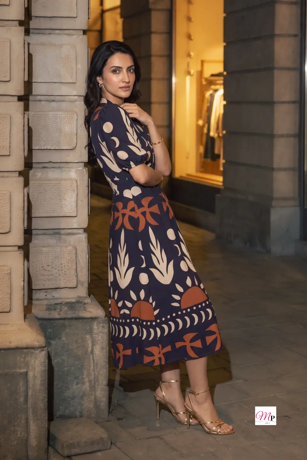 Side view of A-line midi dress showing drape and calf-length hem with heels — sangeet aur dinner date dono ke liye