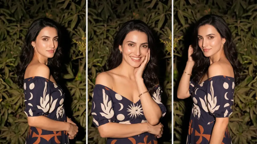 DressBerry printed crepe midi dress in navy sun-and-moon botanical print worn off-shoulder at night