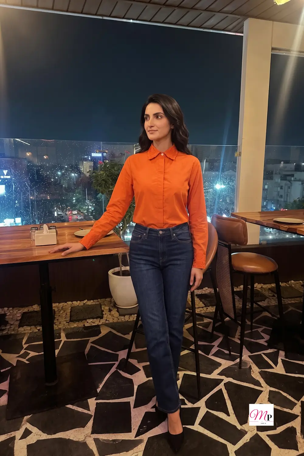Women formal shirt office-to-dinner styling with city lights at night — shaadi season ke baad ki office look